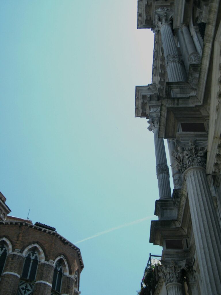 A tall building with a clock on the side of it